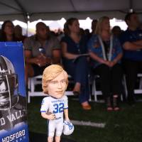 A bobblehead of Jamie Hosford sitting on a table at the Jamie Hosford Football Center dedication.